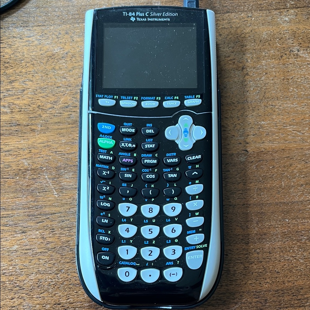 Texas instruments TI-84 plus C silver edition calculator,cover and charging cord